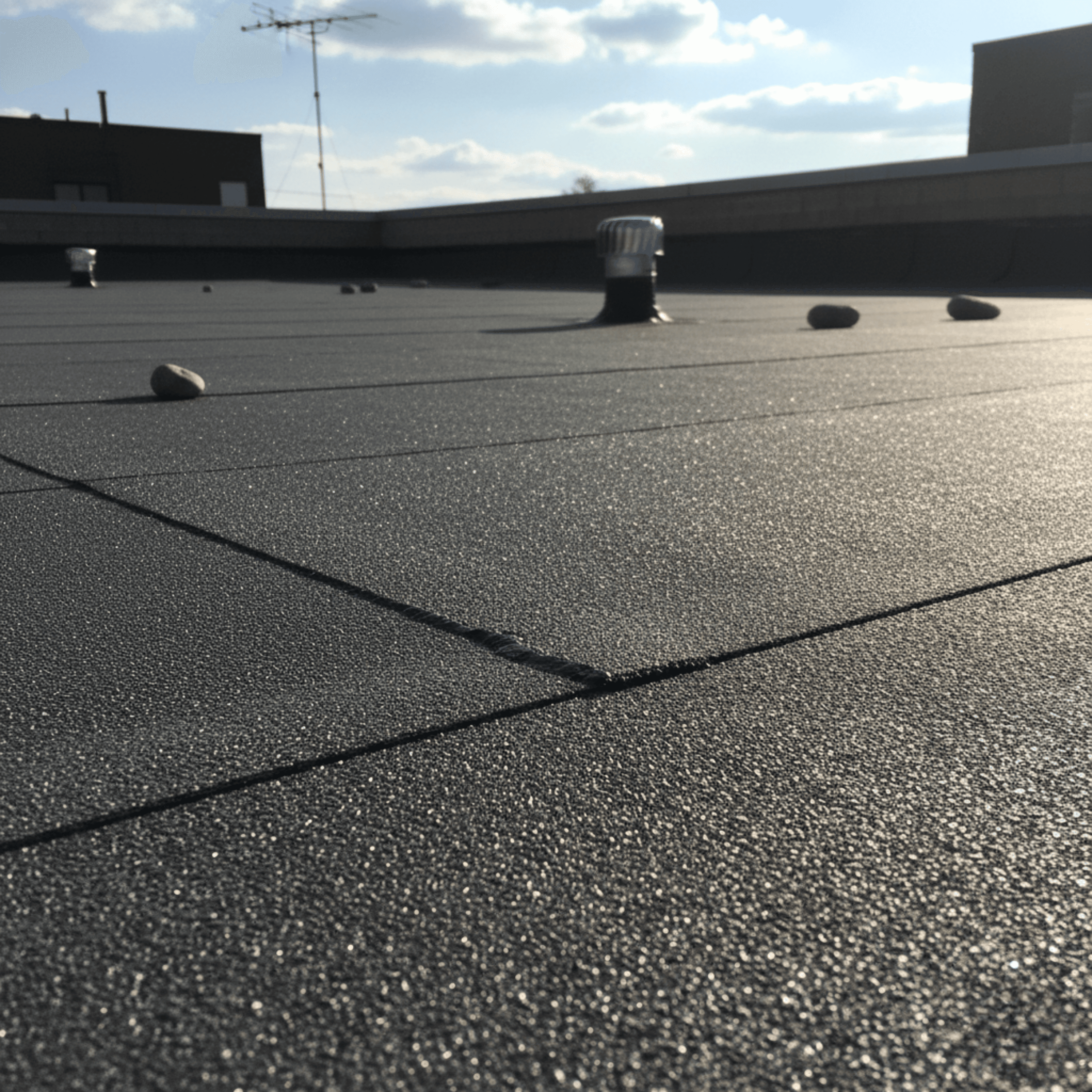 Modified bitumen roofing material - temperature requirements for warranty protection